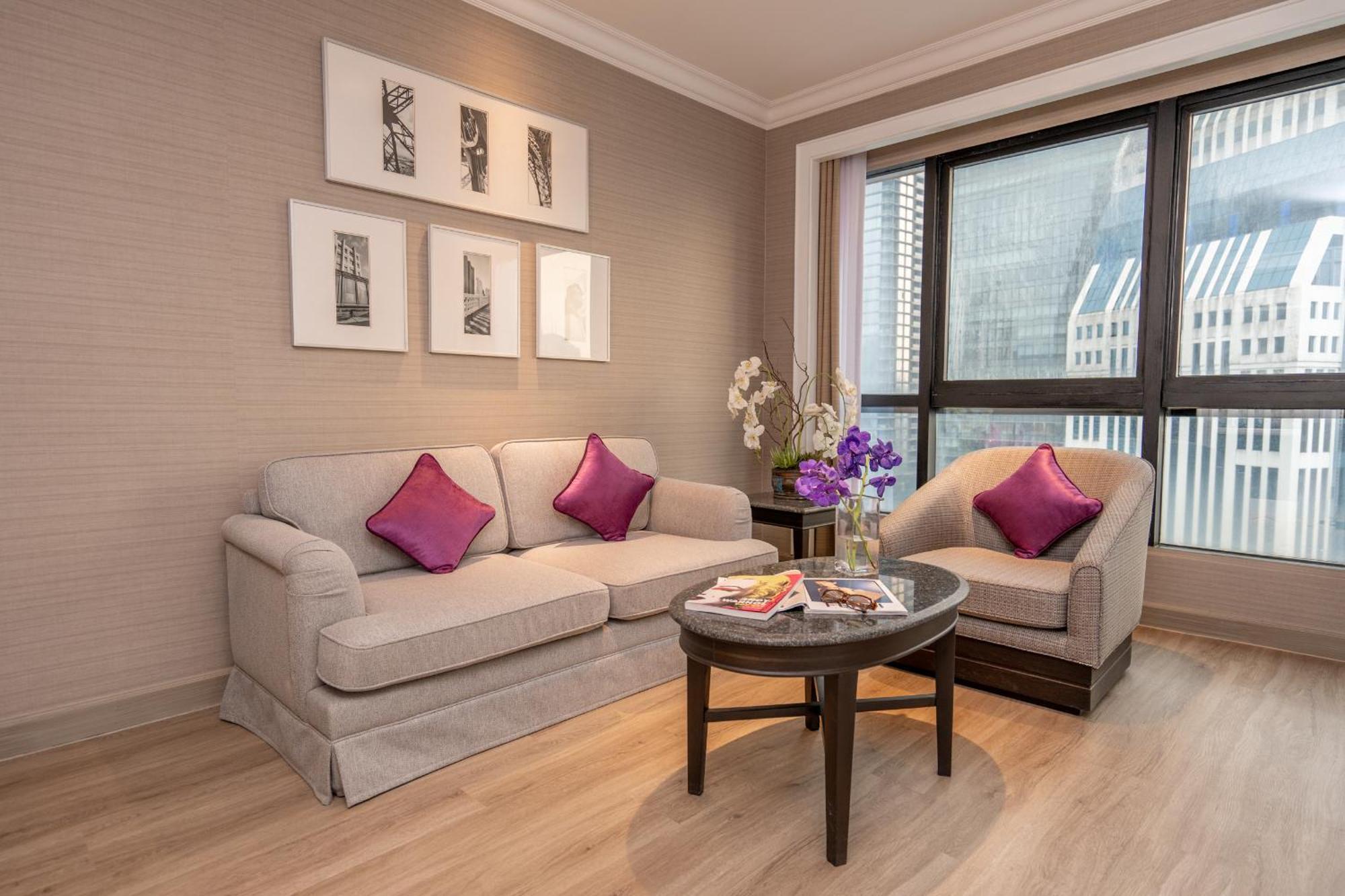 Nh Bangkok Sukhumvit Boulevard Екстер'єр фото A living room in a hotel suite
